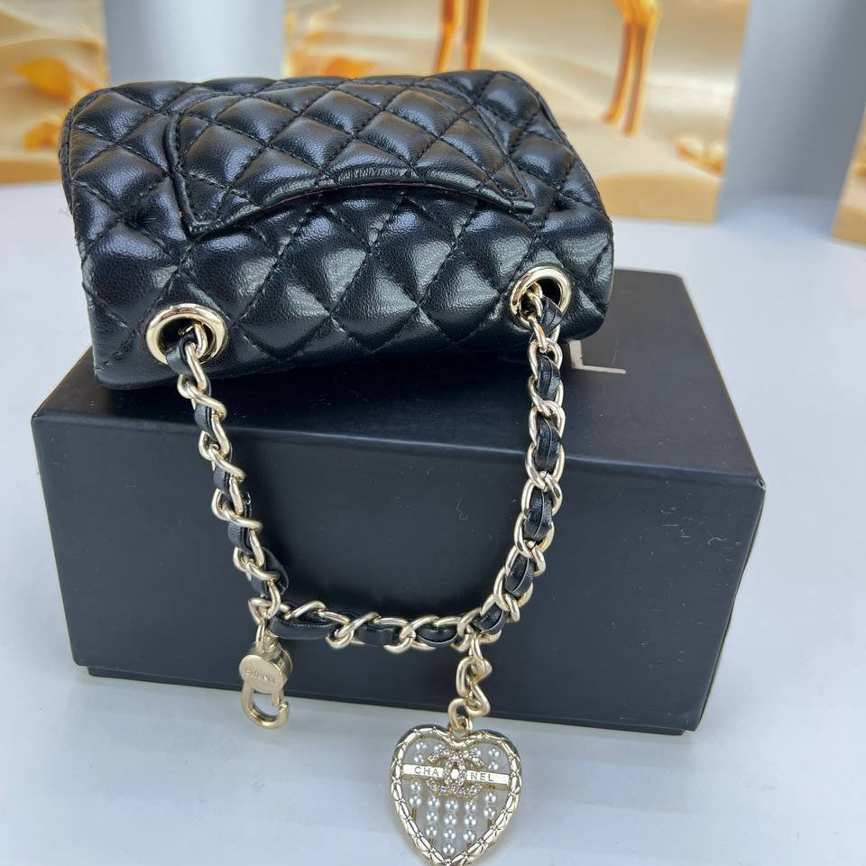 Chanel Quilted Mini Bag with Signature Heart Charm 🖤✨