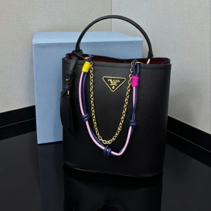 Prada Leather Handbag with Decorative Chain and Strap