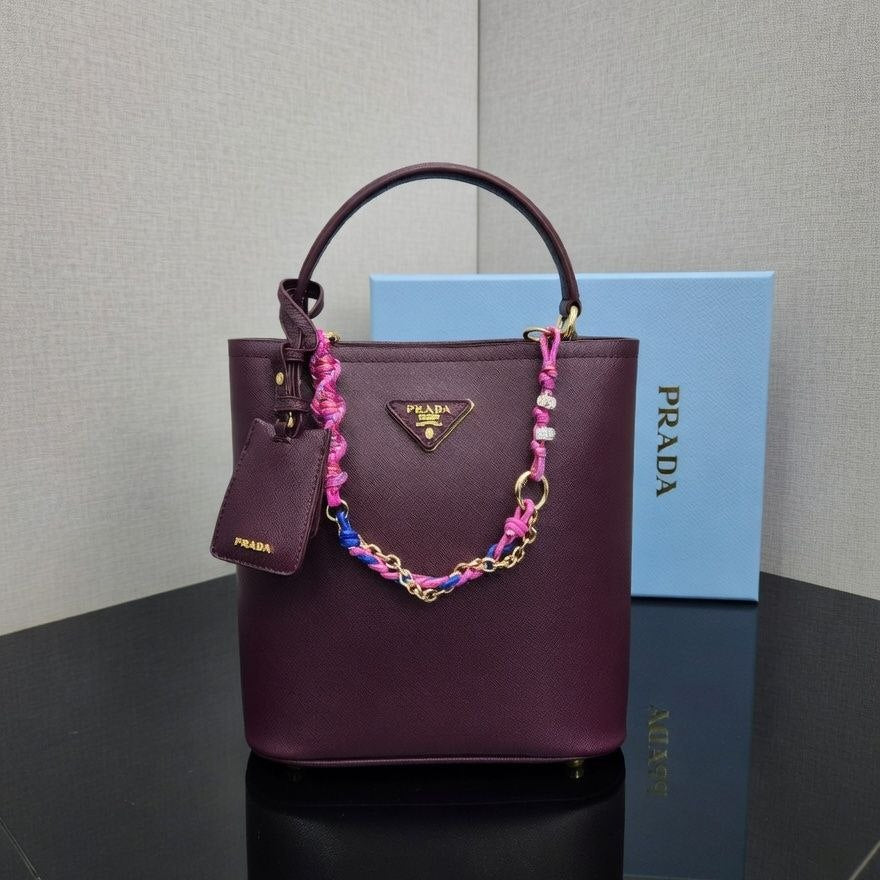 Prada Leather Handbag with Decorative Chain and Strap