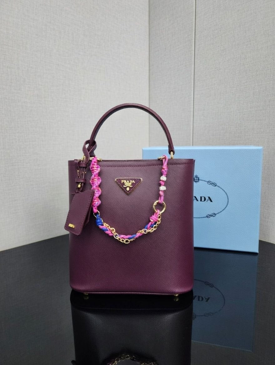 Prada Leather Handbag with Decorative Chain and Strap