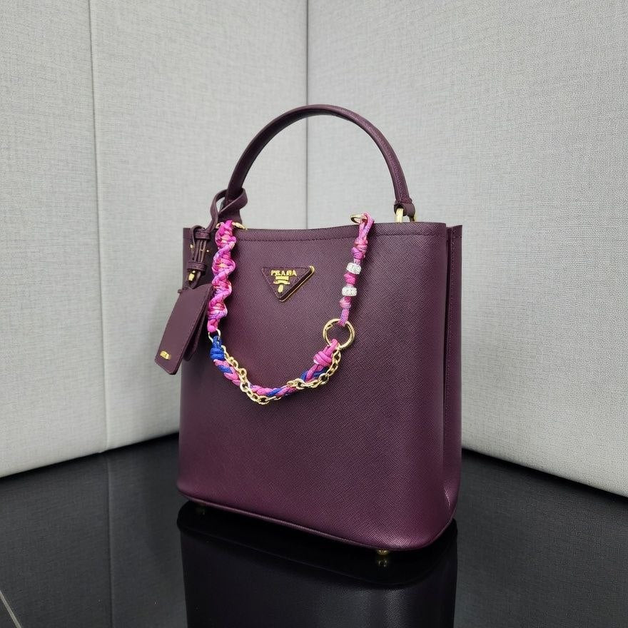 Prada Leather Handbag with Decorative Chain and Strap