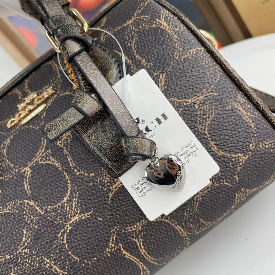 Coach Signature Monogram Mini Brown Bag with Heart Charm