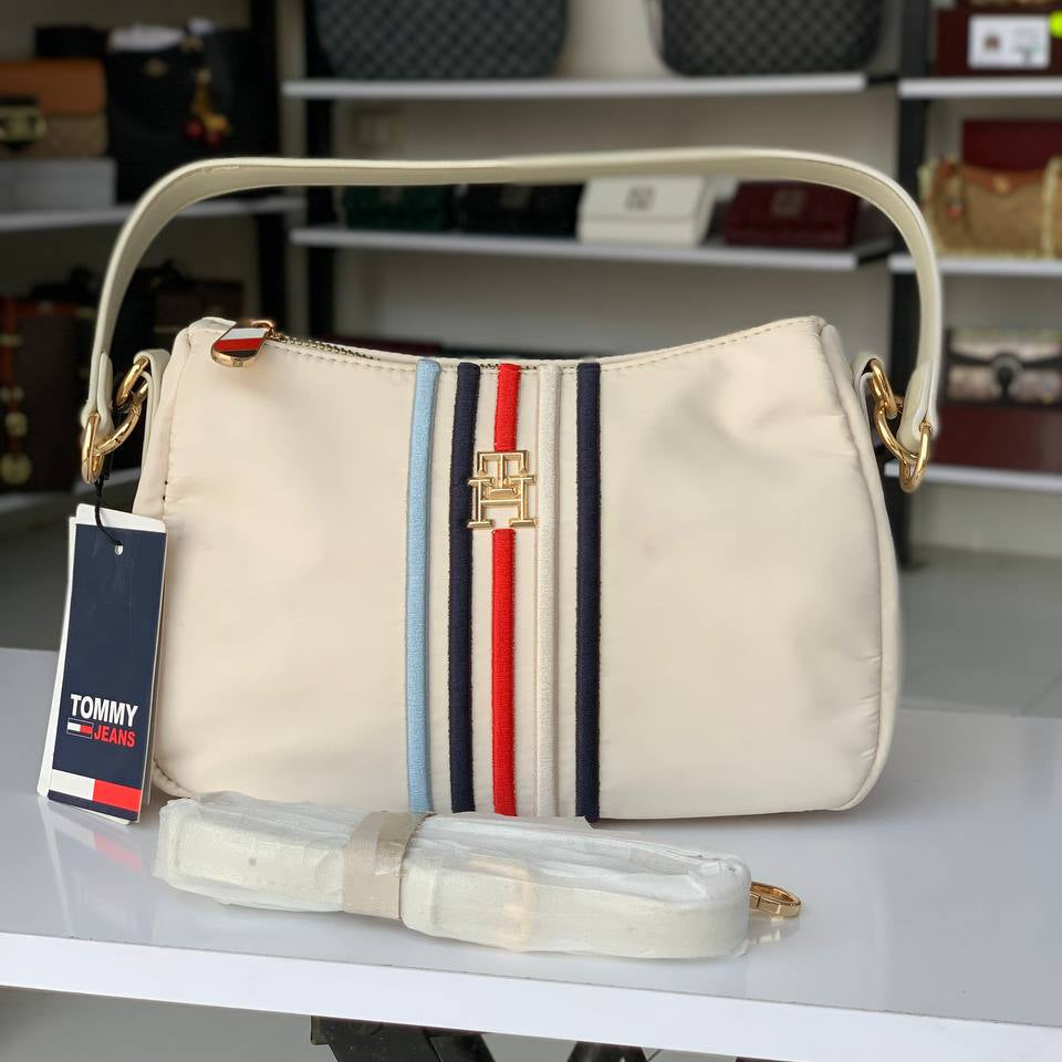 Tommy Bag: Classic Style with Dust Bag 👜