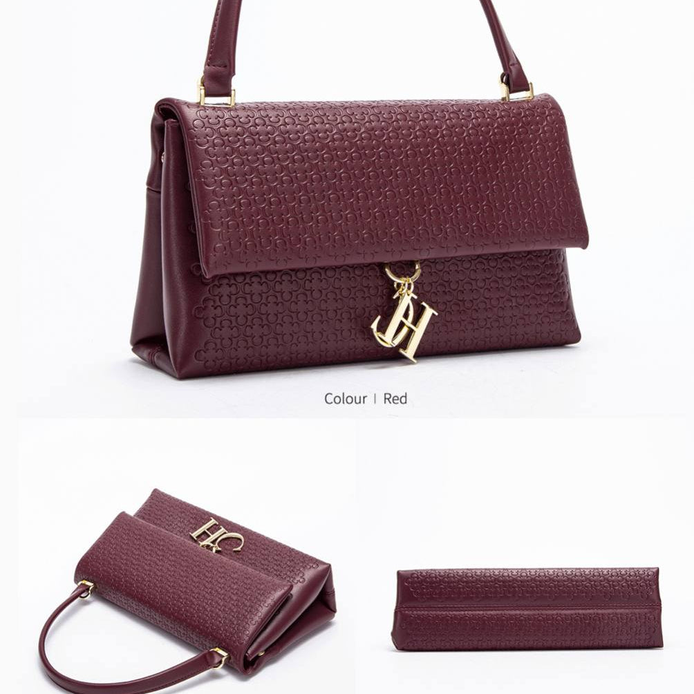 Chic Embossed Black Handbag with Gold-Tone Charm 🖤👜✨