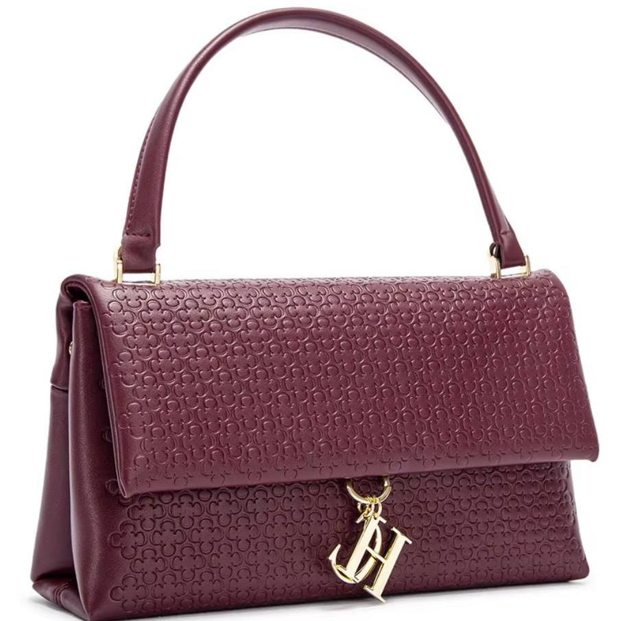 Chic Embossed Black Handbag with Gold-Tone Charm 🖤👜✨