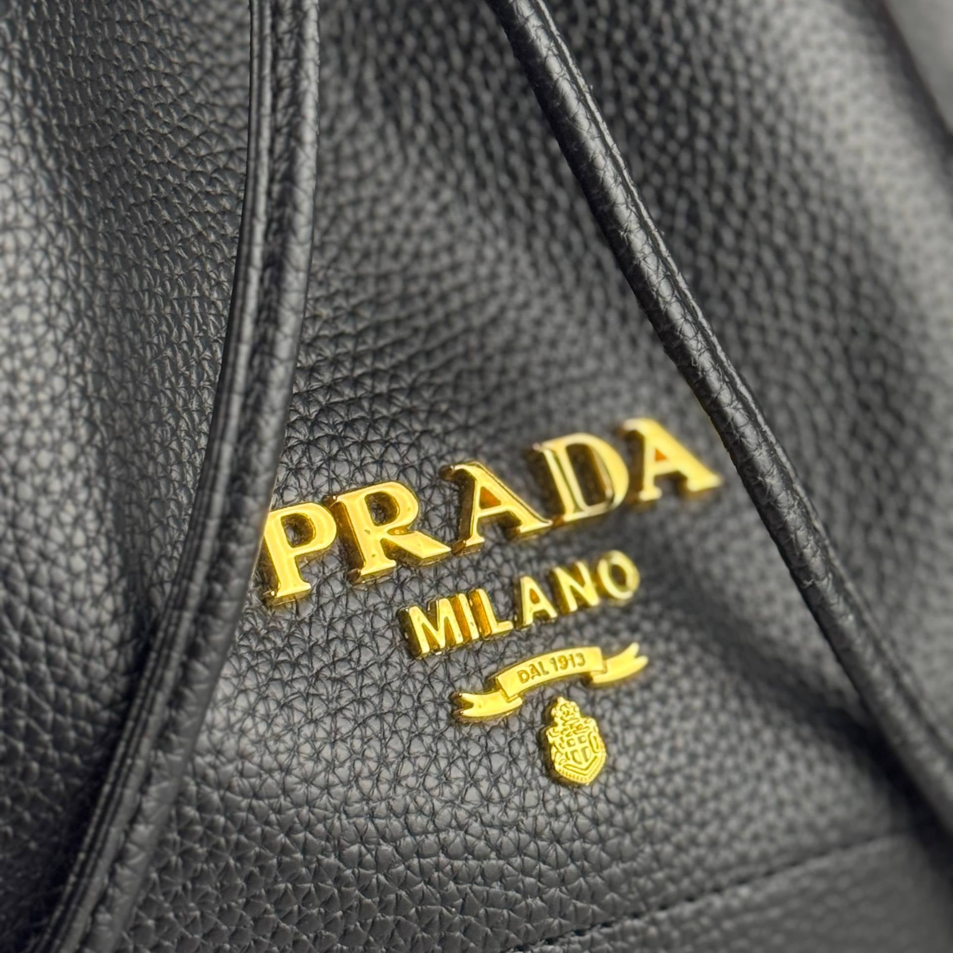 Prada Leather Bucket Bag with Gold Hardware 👜✨