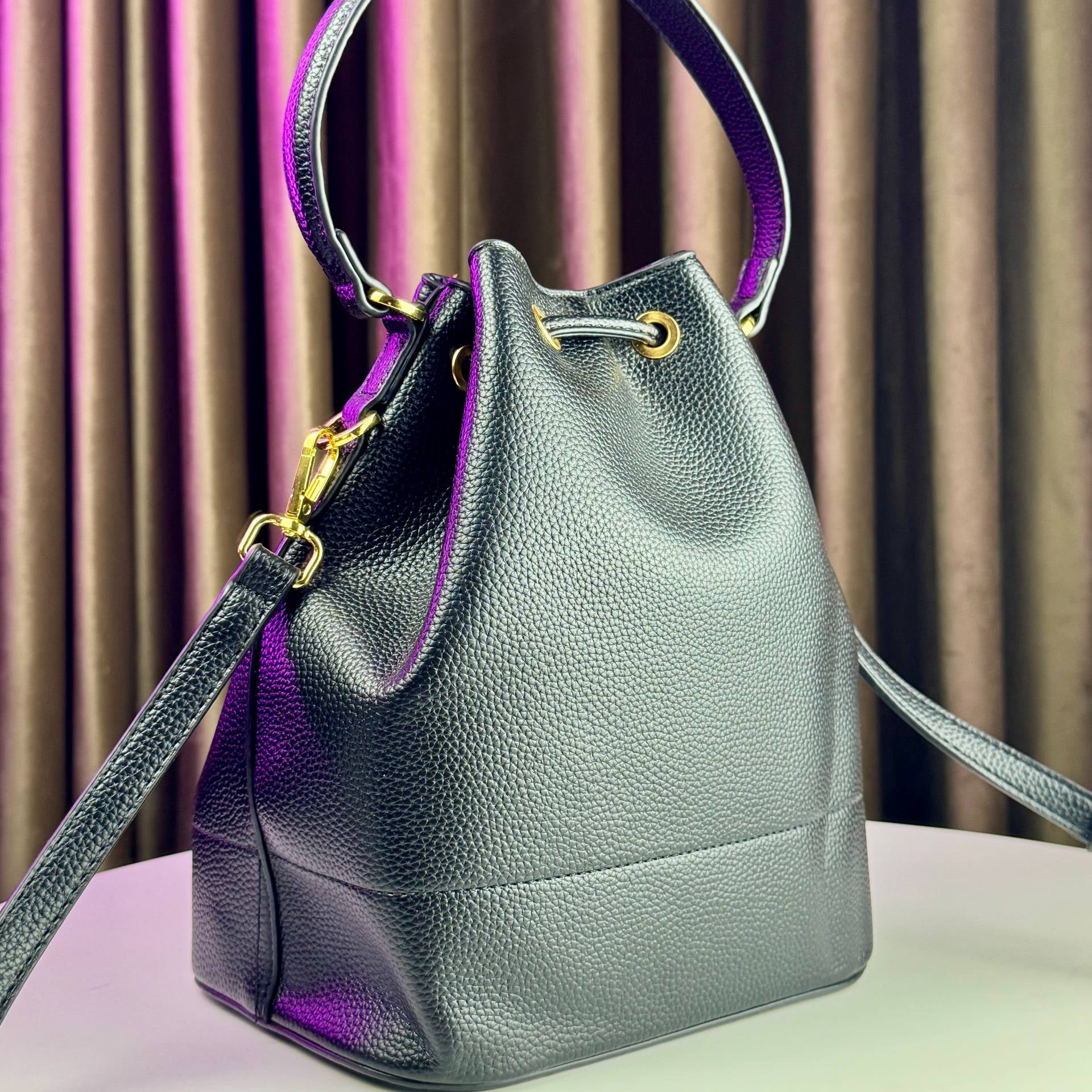 Prada Leather Bucket Bag with Gold Hardware 👜✨