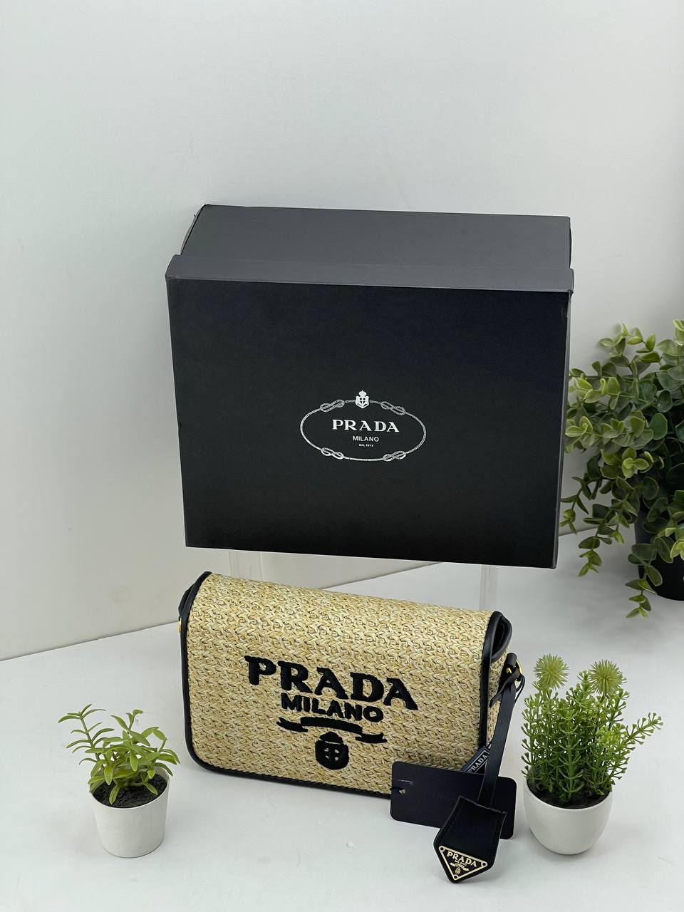 Prada: Chic Beige & Black Shoulder Bag 👜🖤