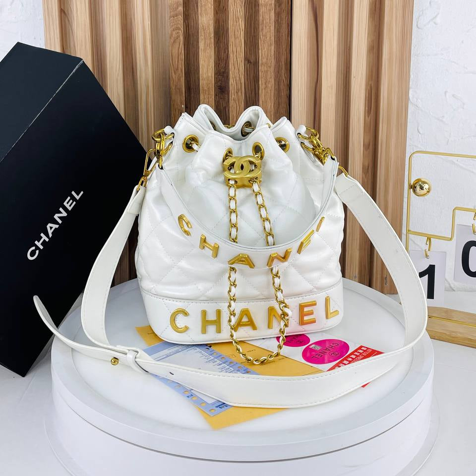 Chanel Quilted White Bucket Bag with Gold Chain Detail