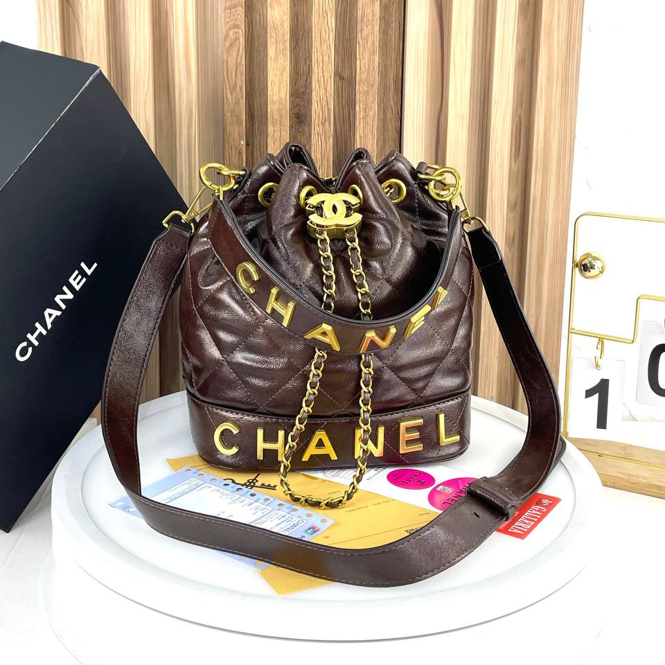 Chanel Quilted White Bucket Bag with Gold Chain Detail