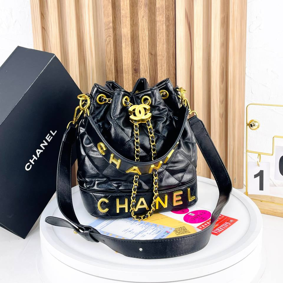 Chanel Quilted White Bucket Bag with Gold Chain Detail