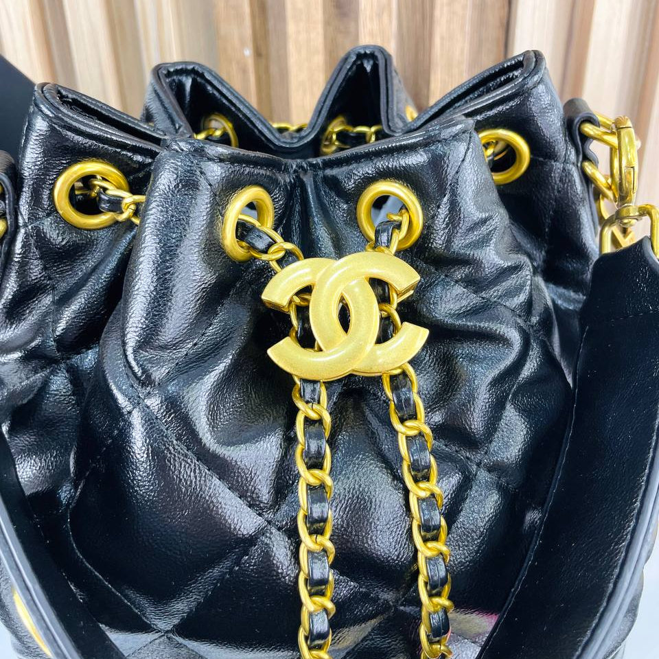 Chanel Quilted White Bucket Bag with Gold Chain Detail