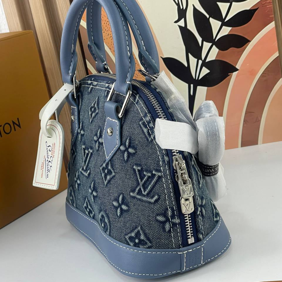 Louis Vuitton Denim Monogram Handbag with Blue Leather Trim
