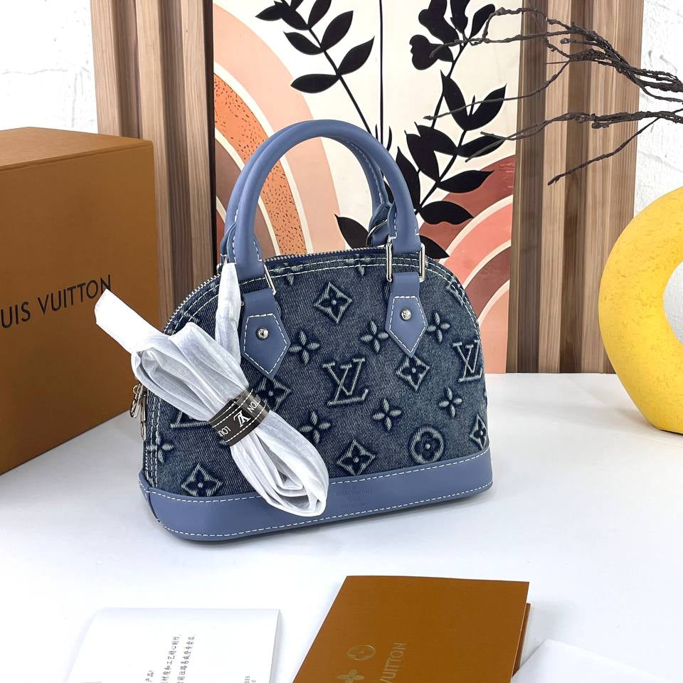 Louis Vuitton Denim Monogram Handbag with Blue Leather Trim