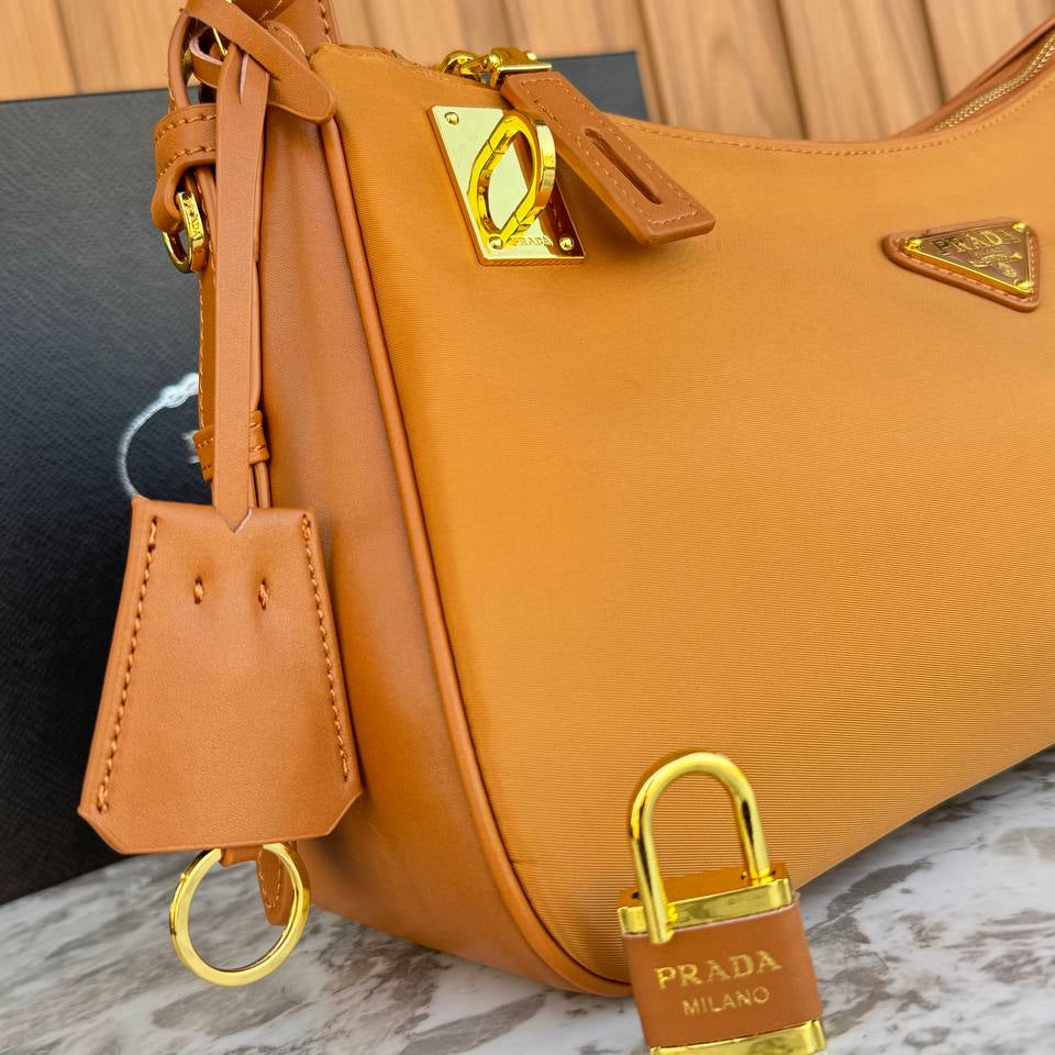 Prada Leather Shoulder Bag with Gold Padlock Detail 👜✨🍂