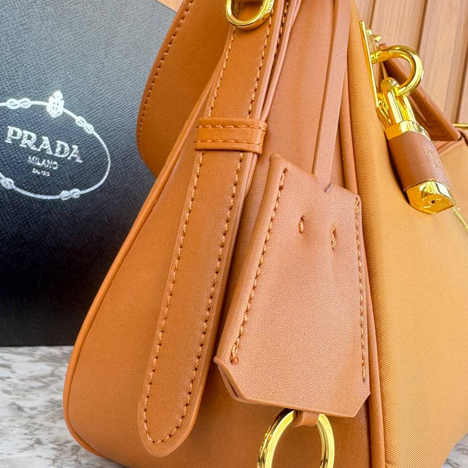 Prada Leather Shoulder Bag with Gold Padlock Detail 👜✨🍂