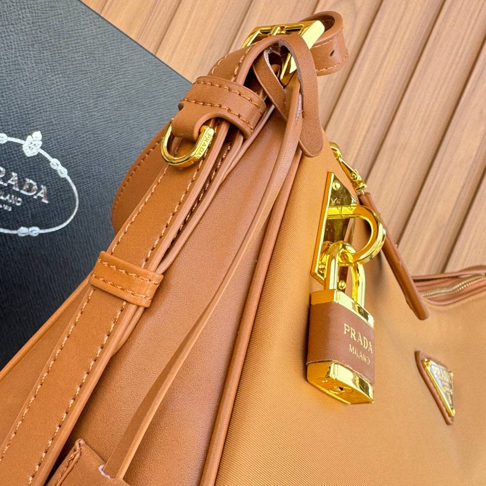 Prada Leather Shoulder Bag with Gold Padlock Detail 👜✨🍂