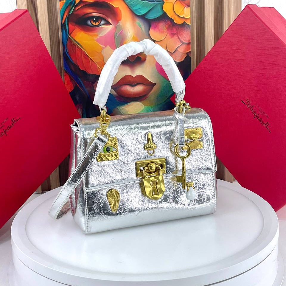 Schiaparelli Large Leather Handbag with Gold Tone Charms