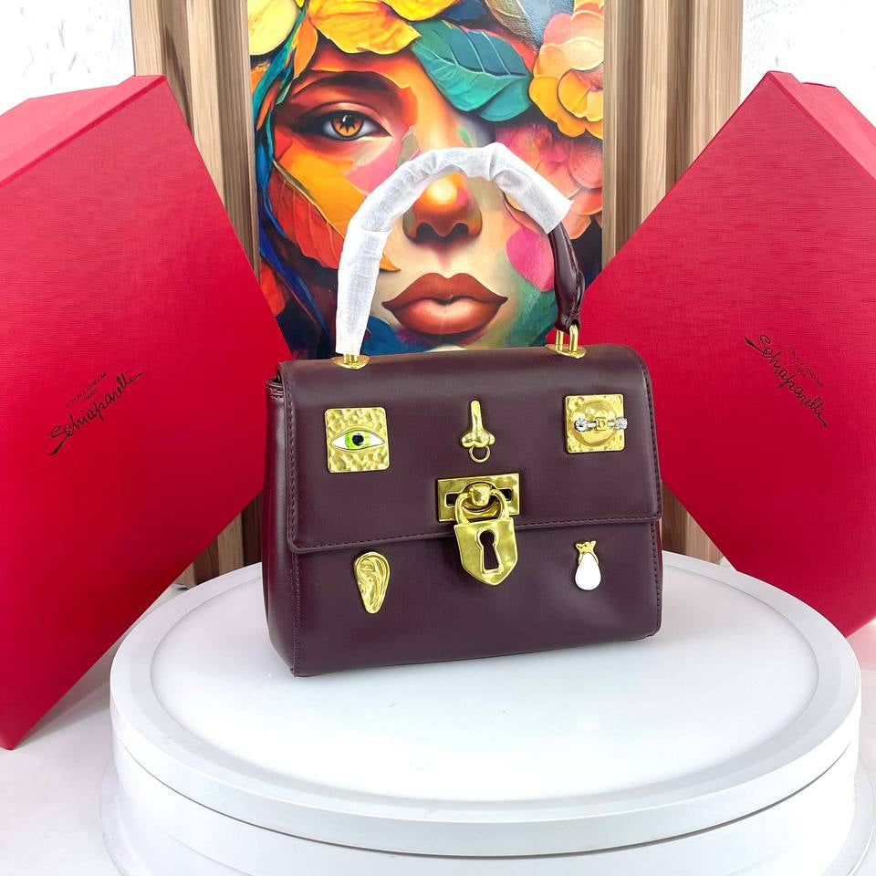 Schiaparelli Large Leather Handbag with Gold Tone Charms