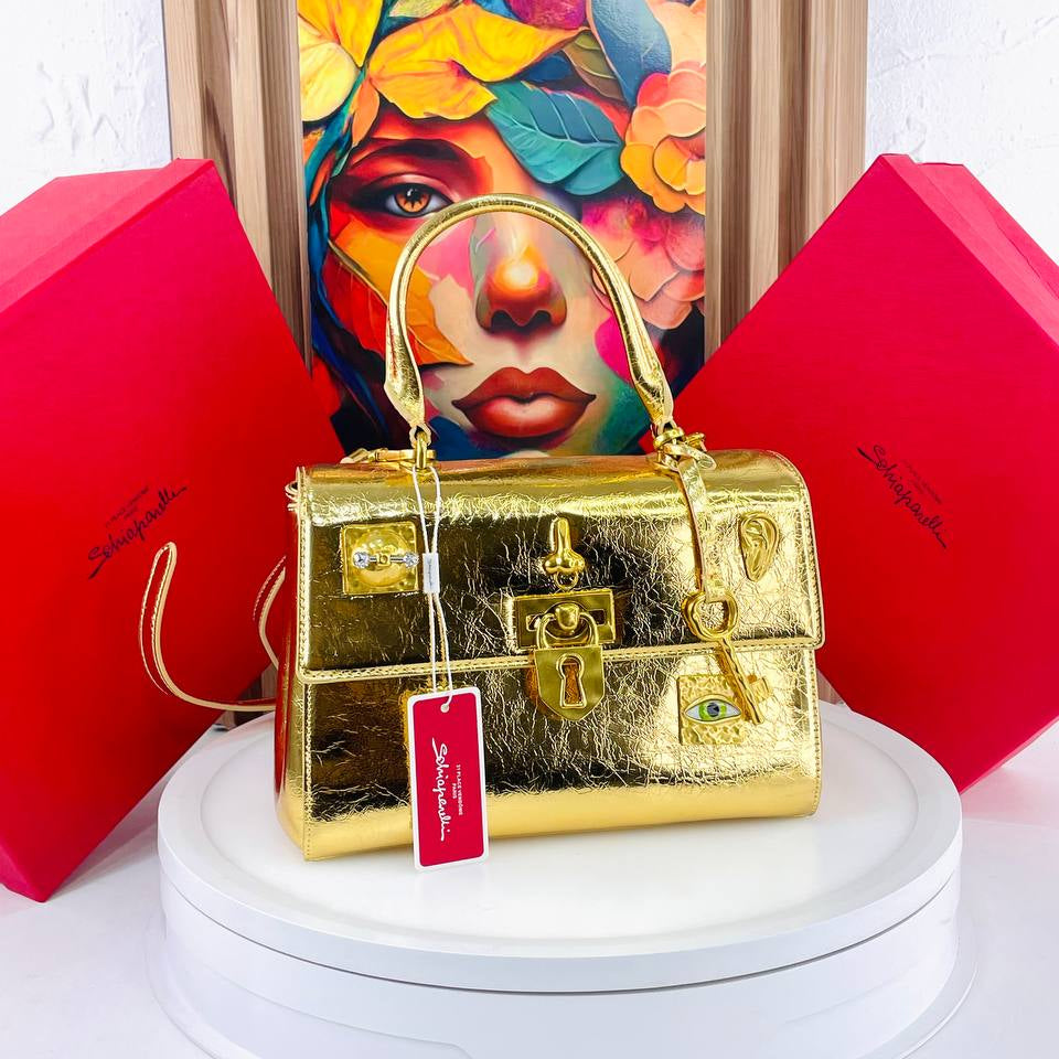 Schiaparelli Large Leather Handbag with Gold Tone Charms