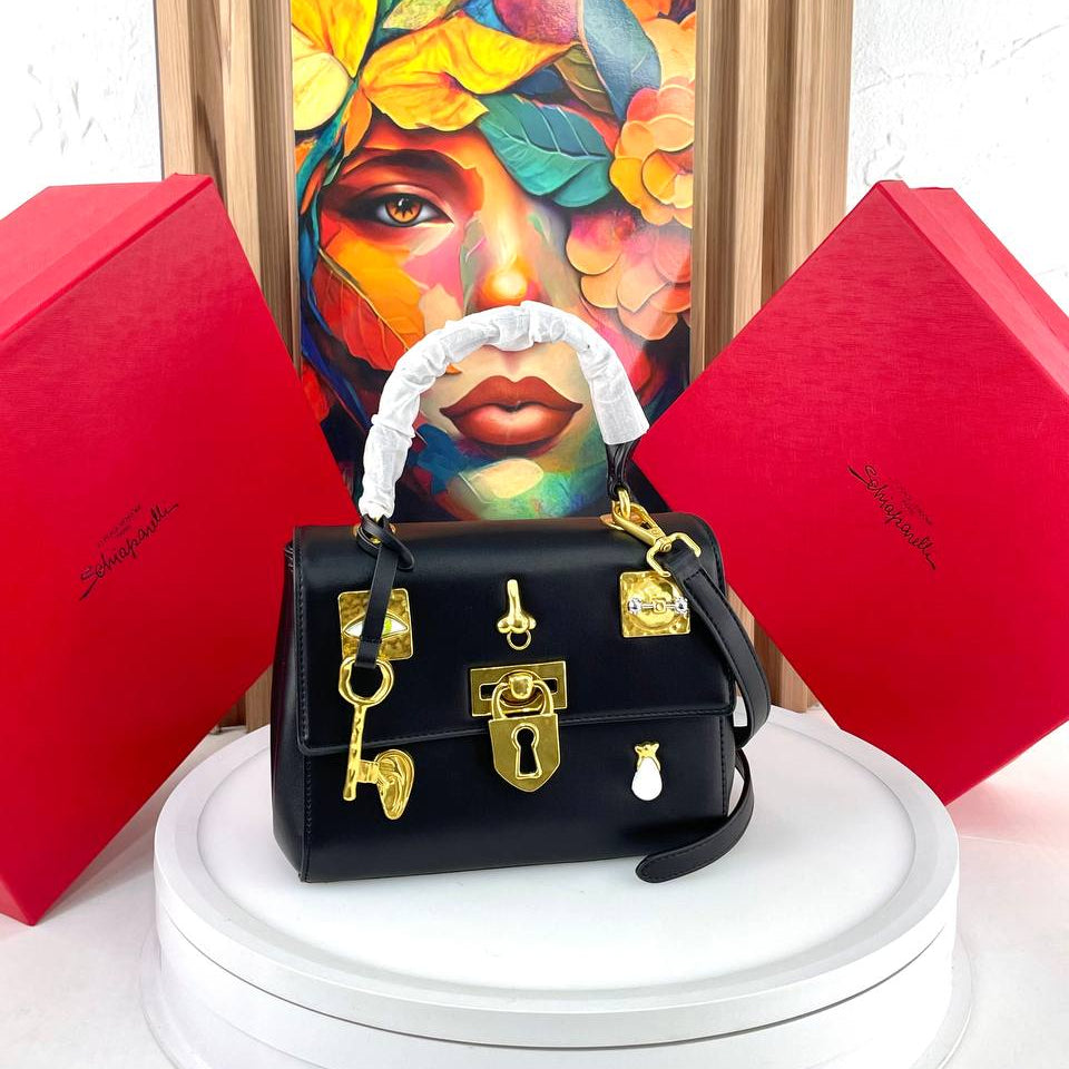 Schiaparelli Large Leather Handbag with Gold Tone Charms