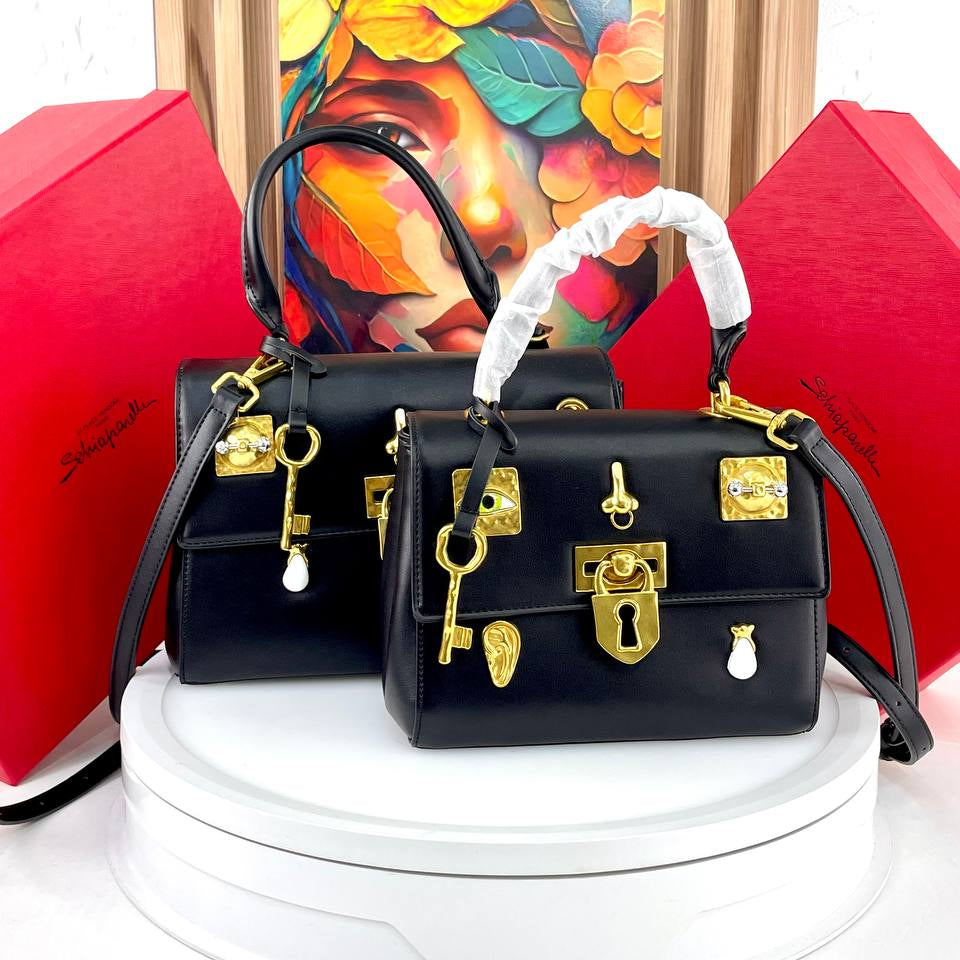 Schiaparelli Large Leather Handbag with Gold Tone Charms