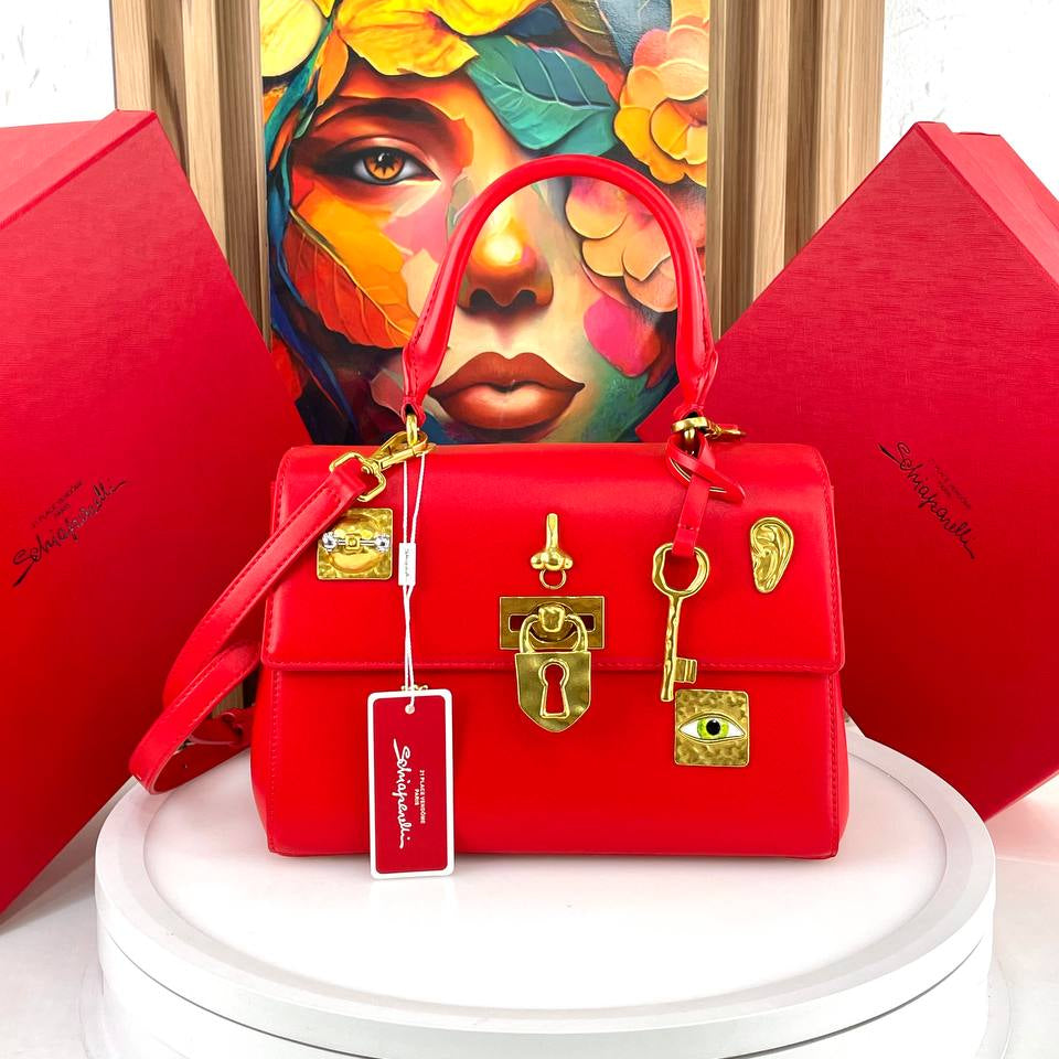 Schiaparelli Large Leather Handbag with Gold Tone Charms
