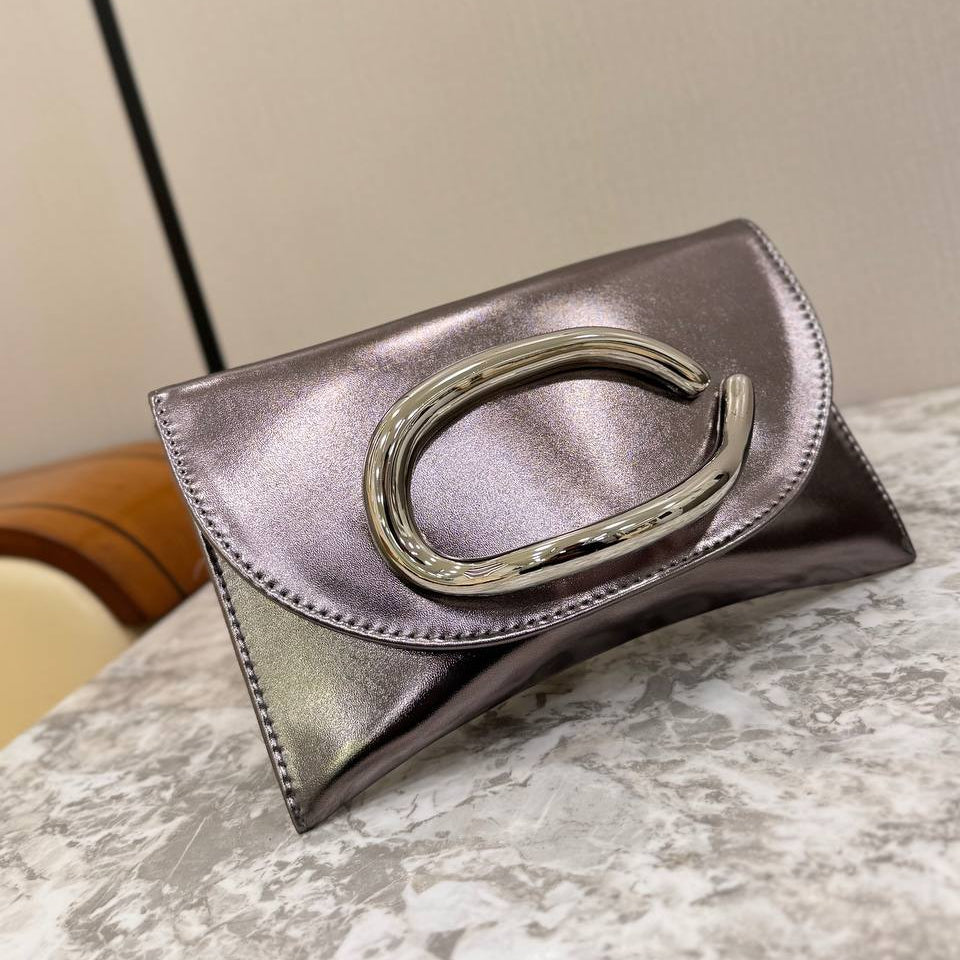 Metallic Gold Envelope Clutch with Sculptural Oval Handle 👜✨🌟