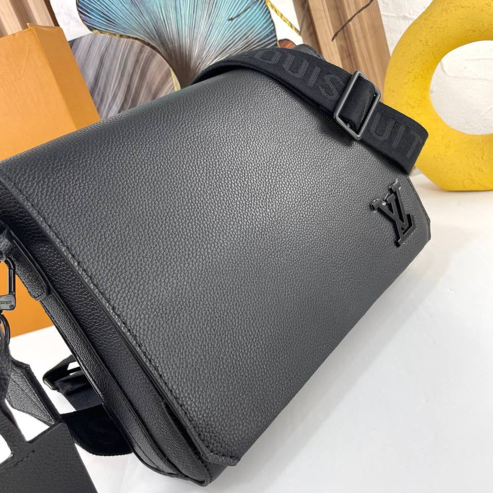Louis Vuitton Blue Messenger Bag with Embossed Logo 💼✨