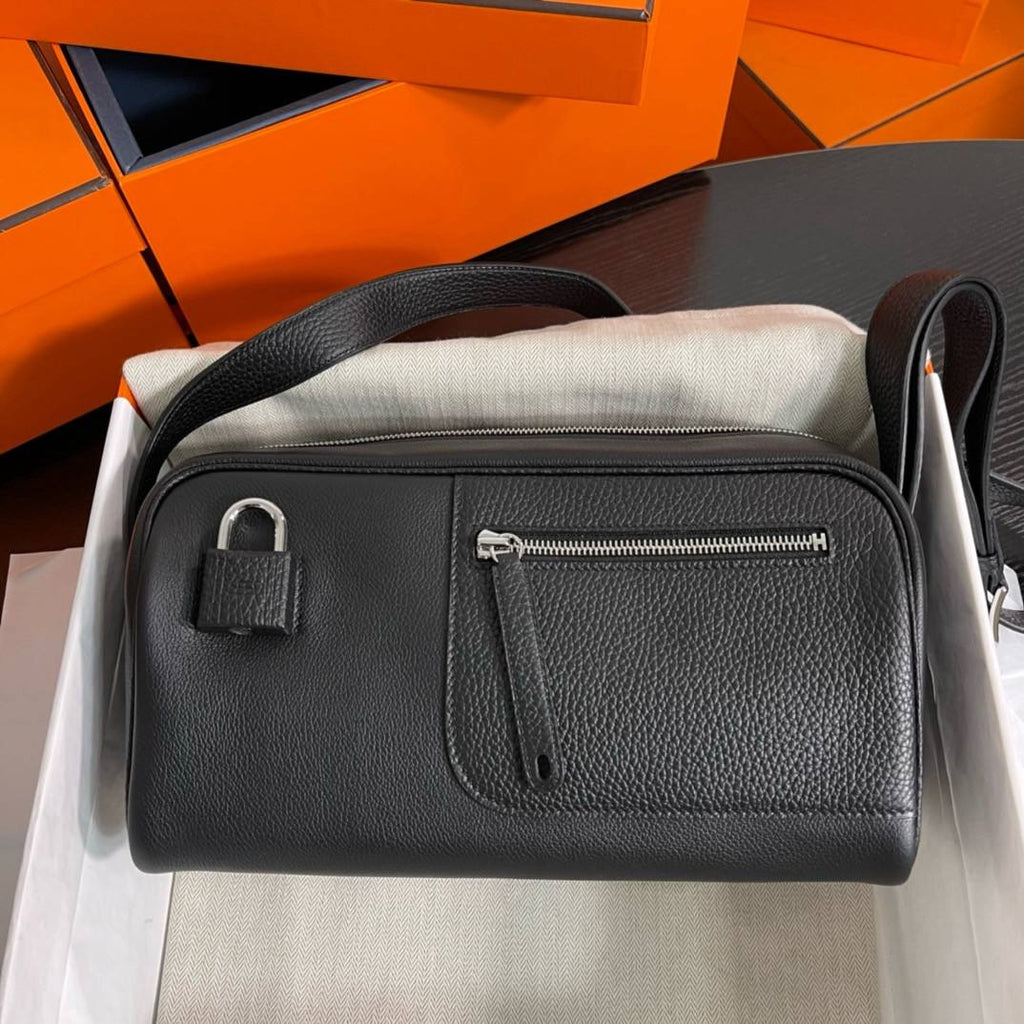 Hermes Textured Crossbody Bag with Signature Lock Detail 👜✨