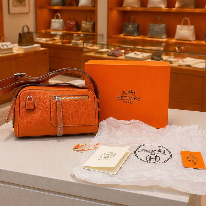 Hermes Textured Crossbody Bag with Signature Lock Detail 👜✨