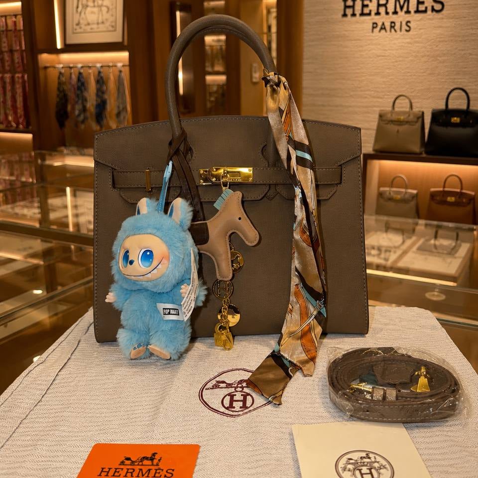 Hermes Style Handbag with Playful Labubu Doll Charm 👜✨