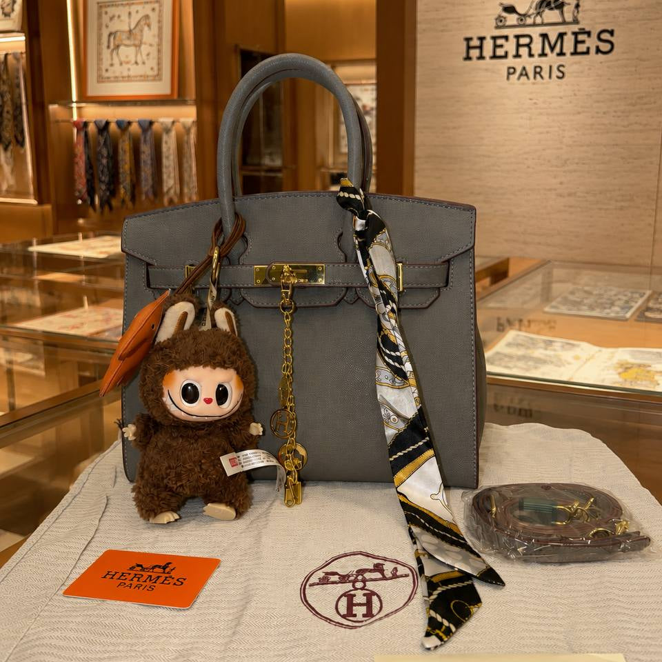 Hermes Style Handbag with Playful Labubu Doll Charm 👜✨