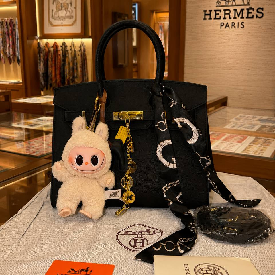 Hermes Style Handbag with Playful Labubu Doll Charm 👜✨