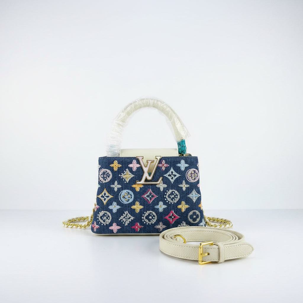 Louis Vuitton Monogram Denim Handbag with Gold Tone Accents