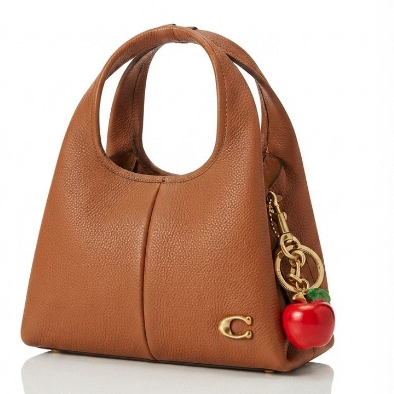 Coach Pebble Grain Leather Handbag with Playful Apple Charm