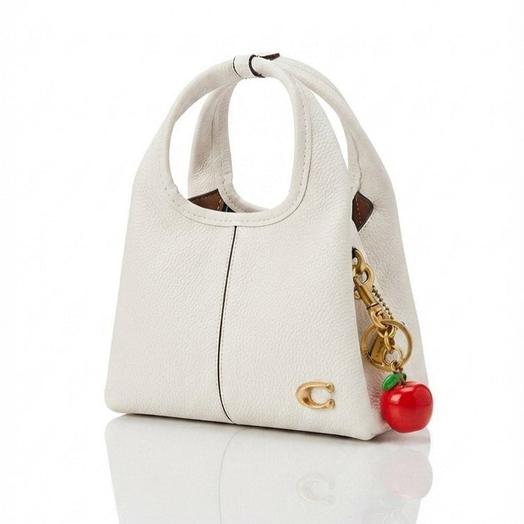 Coach Pebble Grain Leather Handbag with Playful Apple Charm