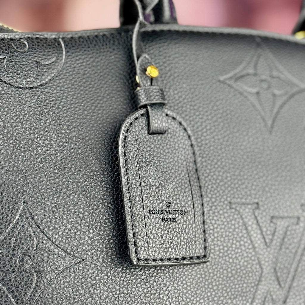 Louis Vuitton Monogram Empreinte Leather Handbag in Black