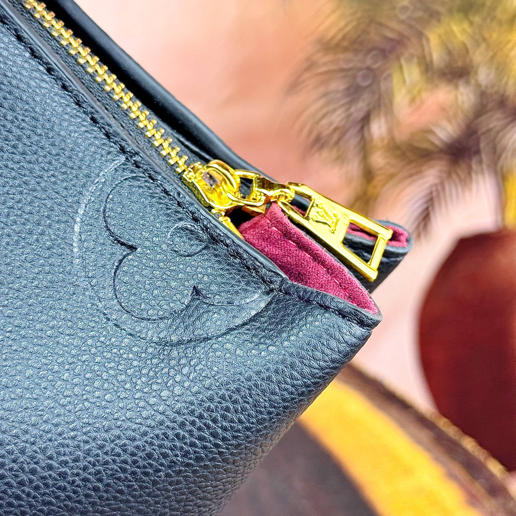 Louis Vuitton Monogram Empreinte Leather Handbag in Black