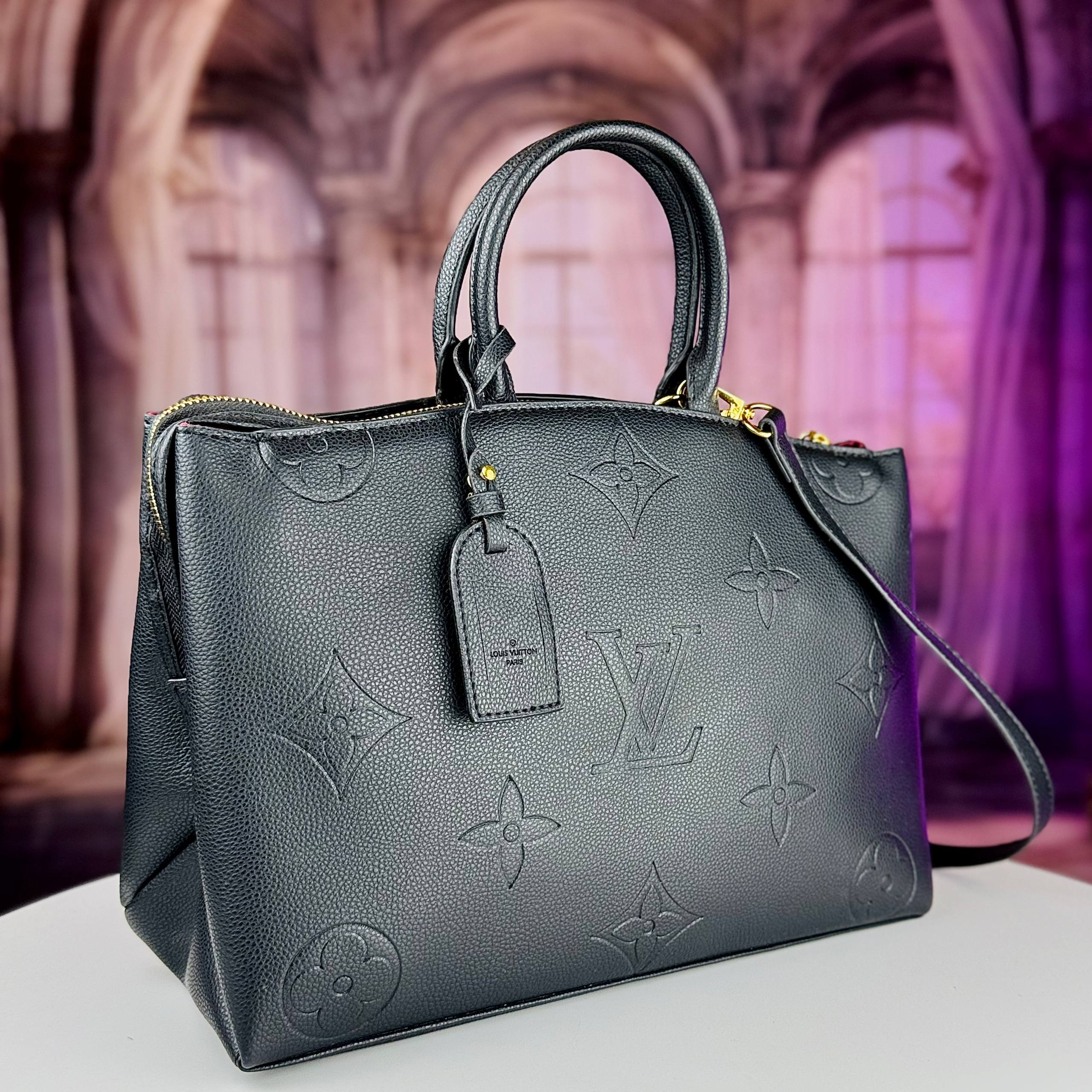 Louis Vuitton Monogram Empreinte Leather Handbag in Black