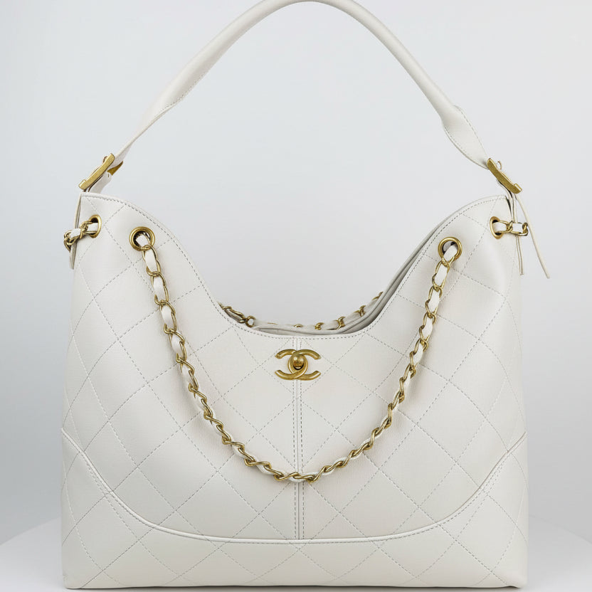 Chanel Quilted Leather Hobo Bag with Gold-Tone Chain 👜✨⚪
