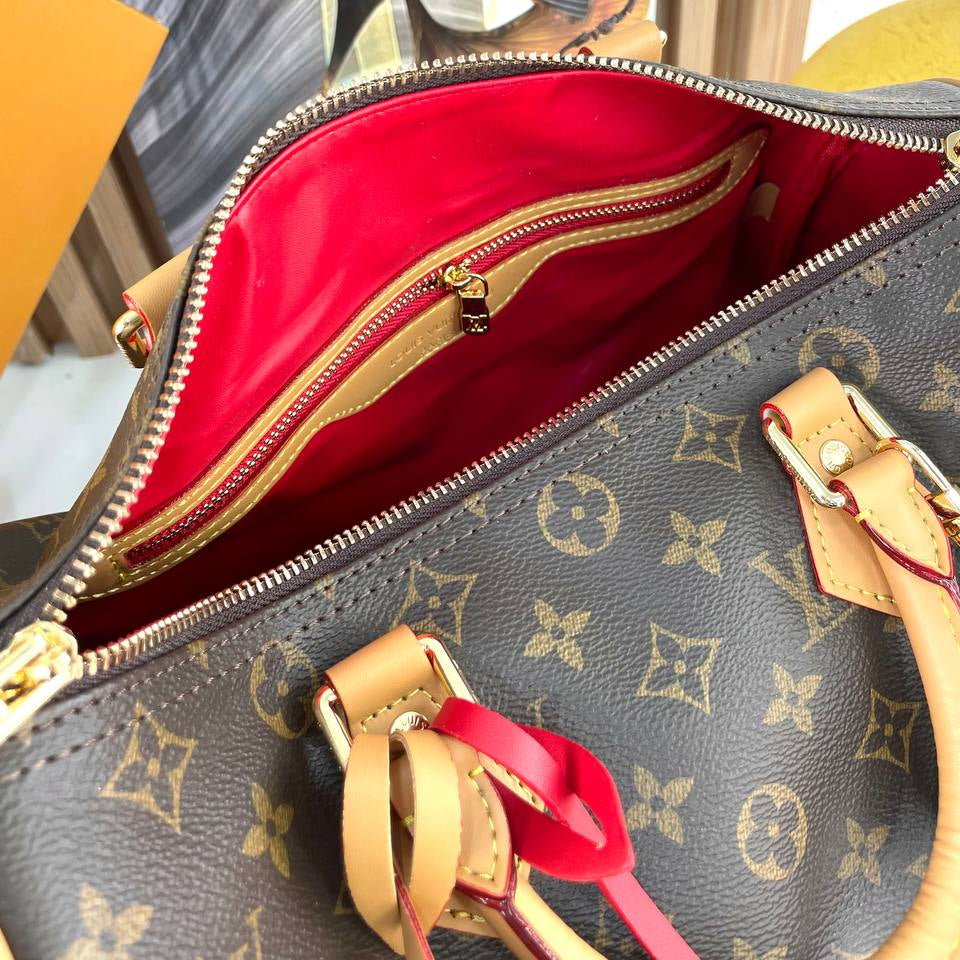 Louis Vuitton Monogram Canvas Bag with Burgundy Leather Accents
