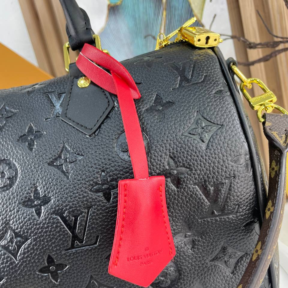 Louis Vuitton Monogram Canvas Bag with Burgundy Leather Accents