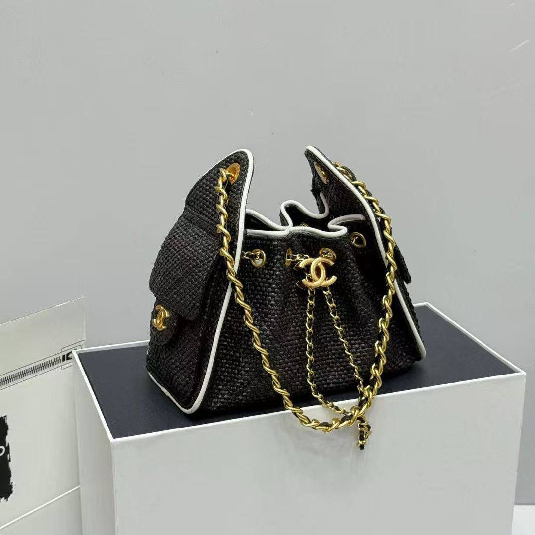 Chanel Woven Straw Bucket Bag with Gold-Tone Chain Details 👜✨