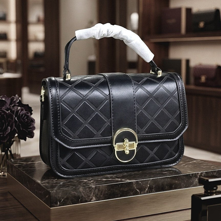 Elegant Quilted Top Handle Crossbody with Gold Tone Lock