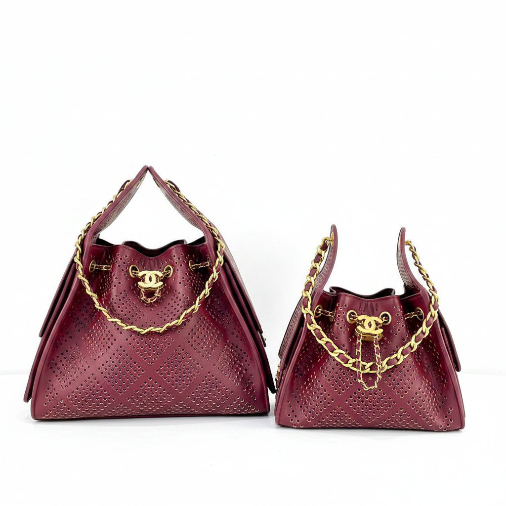 Chanel Perforated Leather Bucket Bag with Gold Chain