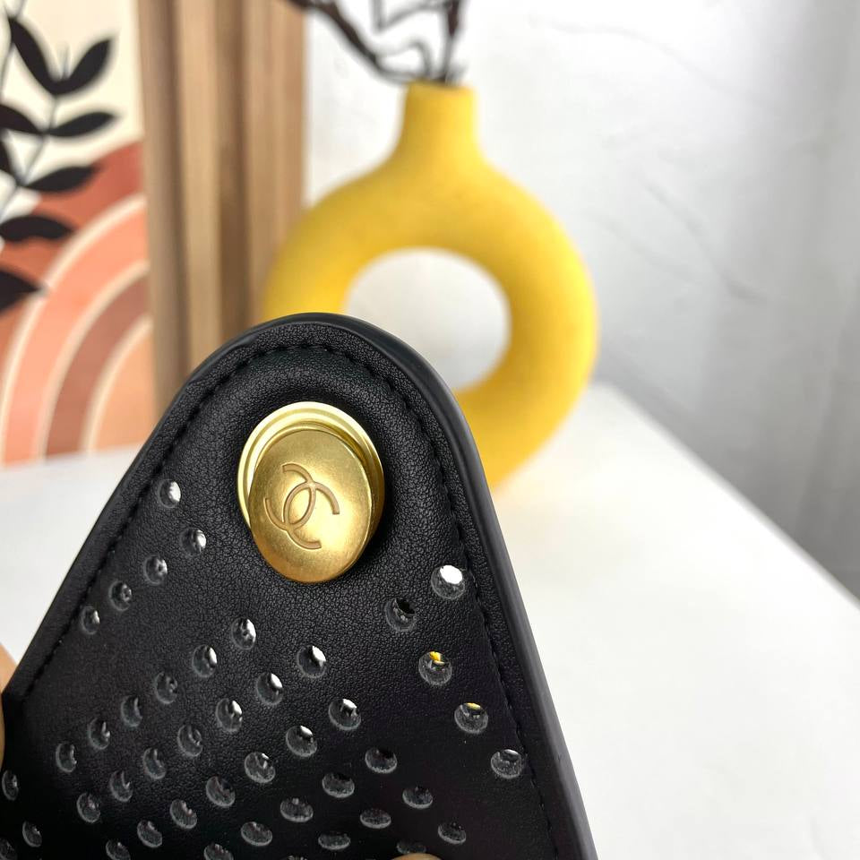 Chanel Perforated Leather Bucket Bag with Gold Chain