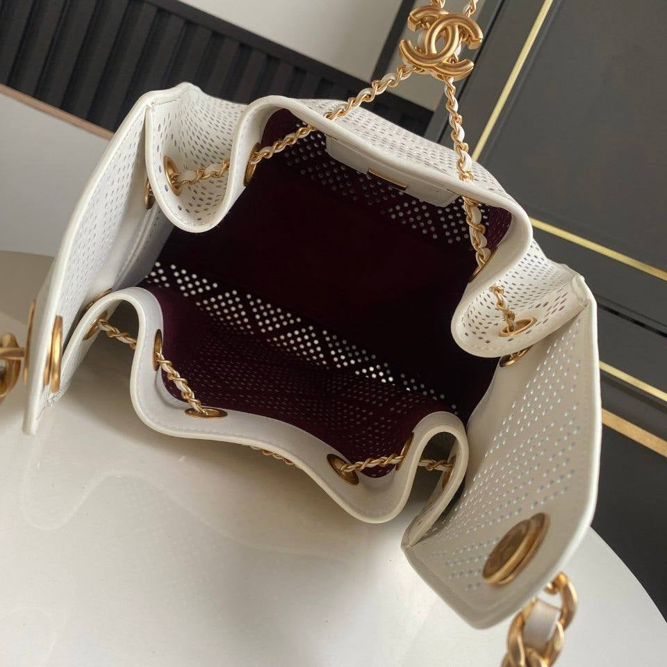 Chanel Perforated Leather Bucket Bag with Gold Chain