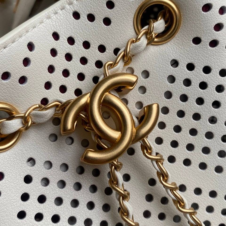 Chanel Perforated Leather Bucket Bag with Gold Chain