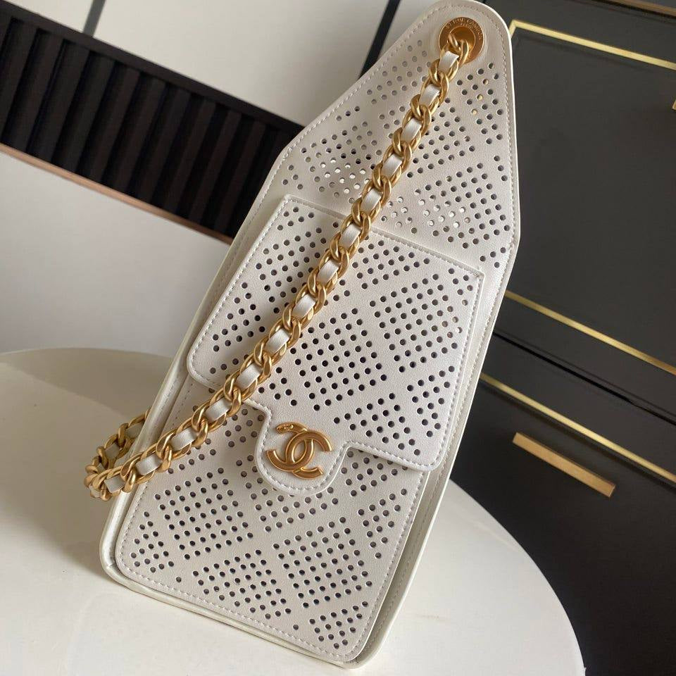 Chanel Perforated Leather Bucket Bag with Gold Chain